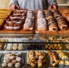 man-dispensing-cakes-in-a-pastry-bakery-royalty-free-image-1676319170.jpeg